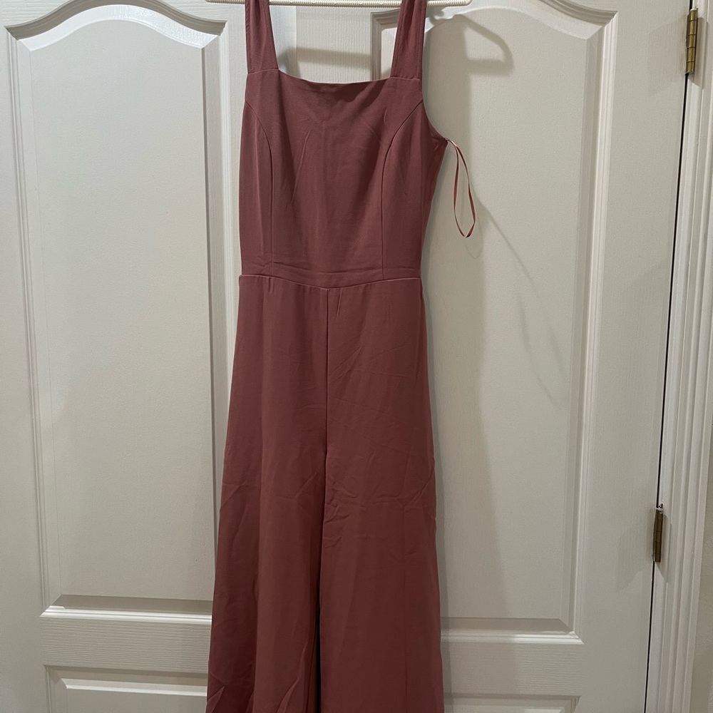 Super cute open back romper